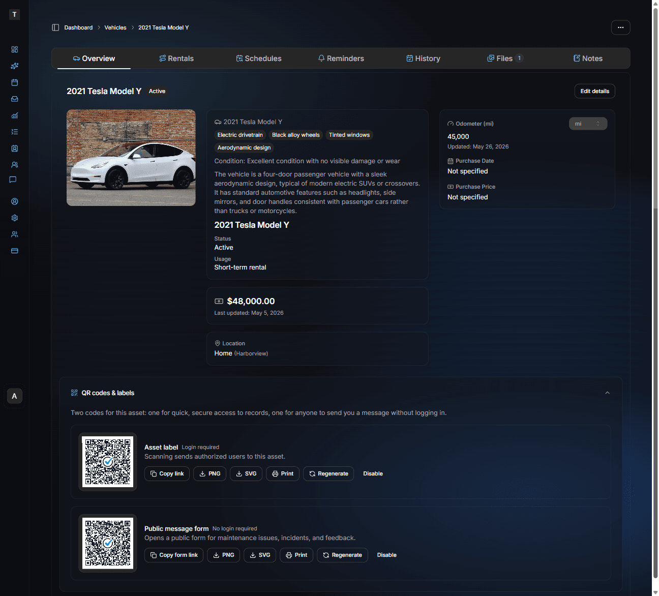 Asset detail page showing QR codes and labels (dark mode)